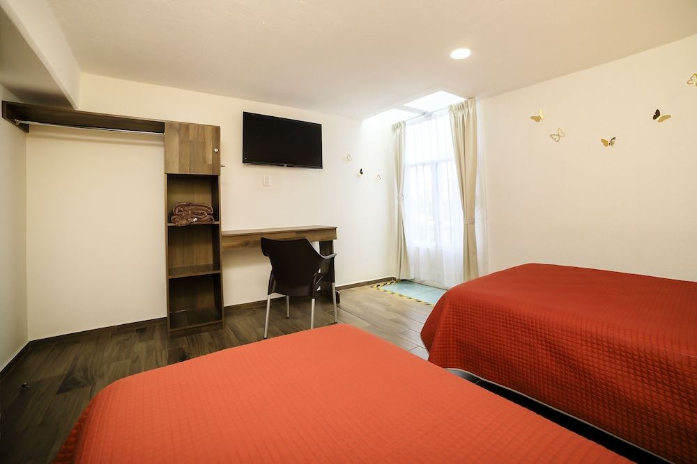 Capital O Hotel Boutique Las Torres Standard Triple Room 3