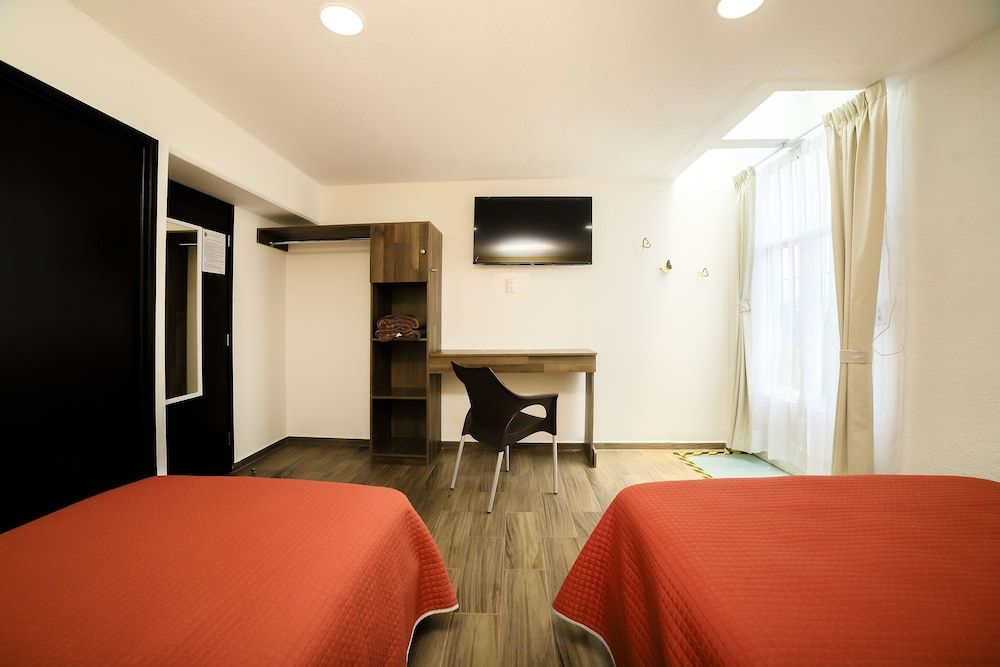 Capital O Hotel Boutique Las Torres Standard Triple Room 6