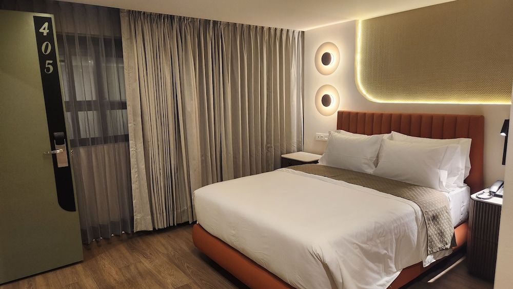 Expo Satelite 2750 Hotel & Suites Habitación Standard