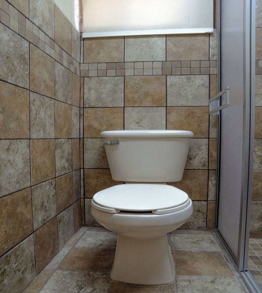 Capital O Hotel Villa Azura Standard Quadruple Room, 2 Double Beds 11