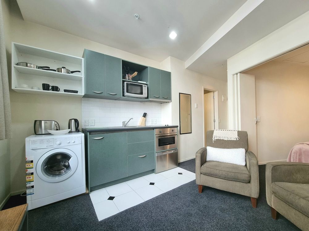 undefined Bright & Cozy 1BR - Kitchen - Laundry 7