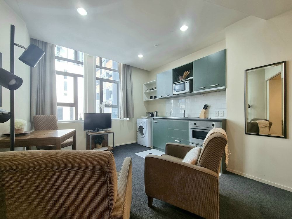 undefined Bright & Cozy 1BR - Kitchen - Laundry 9