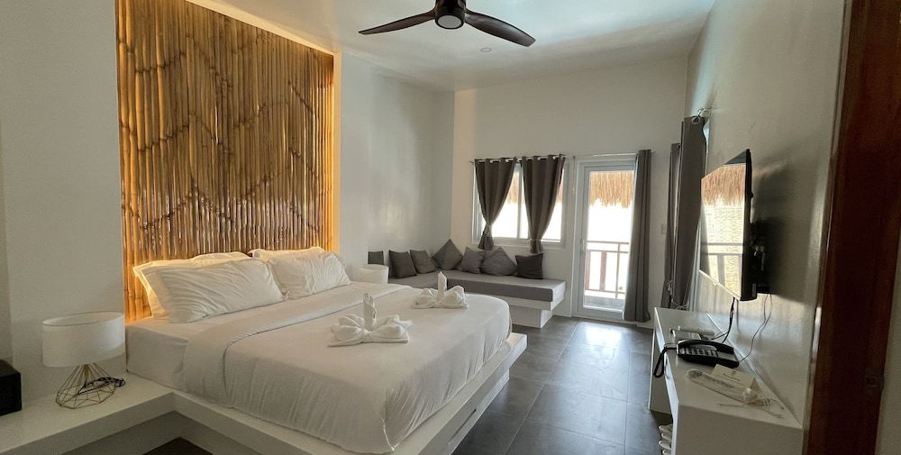 Bathala Resort Deluxe Triple Room 7