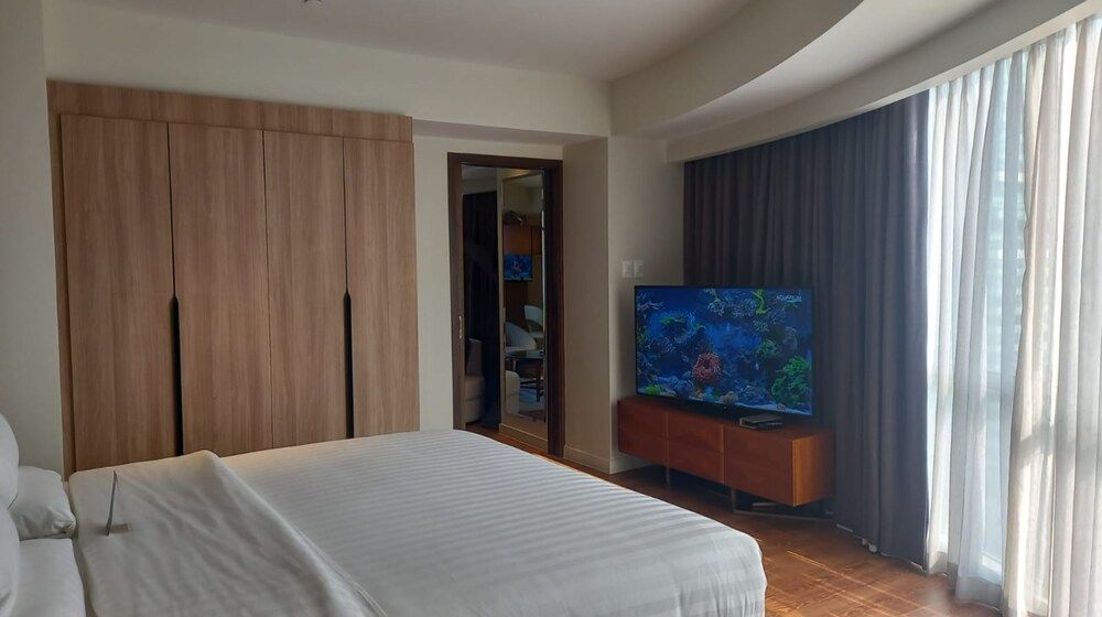 Capital O 950 Acqua Novotel Tower Economy Studio Suite 4