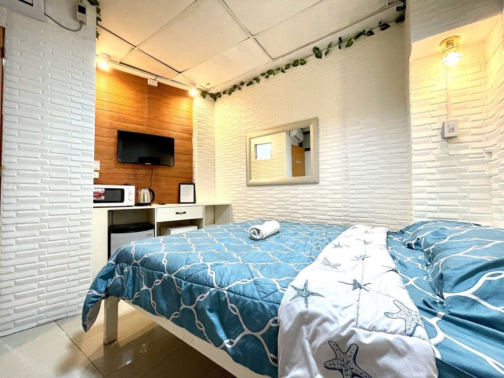 Super OYO 910 Sabaidee Suites