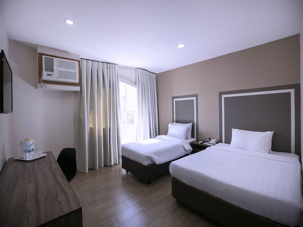 undefined Capital O 911 S Hotel And Residences