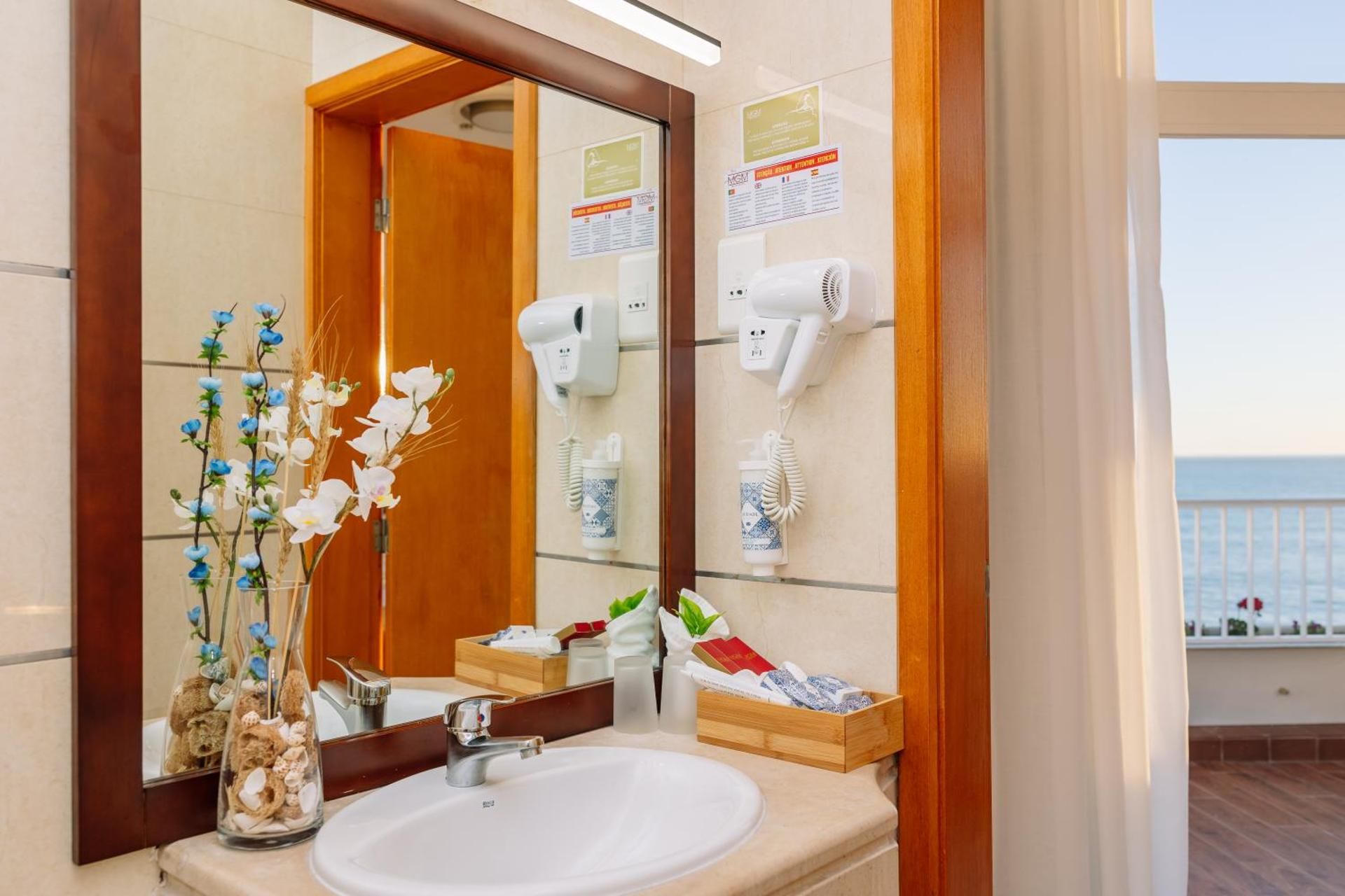 Deluxe Two Bedroom Suite (2 Adults + 2 Children)