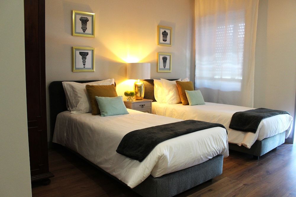 Rosario's Boutique Apartments Studio, 2 Twin Beds, Garden View 6