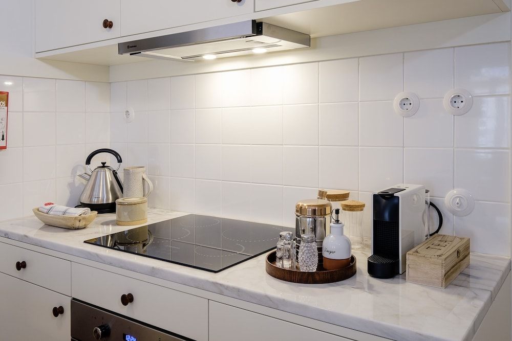 undefined BOUTIQUE Rentals Flores Plaza 7