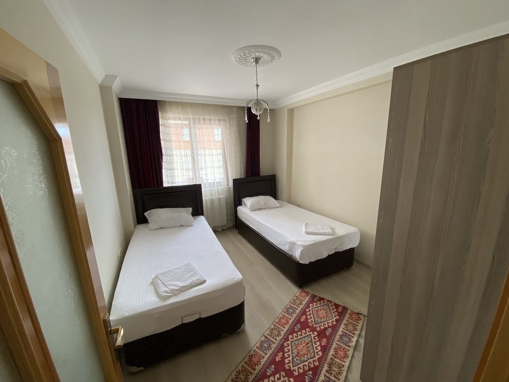 undefined ÖZGÜRCAN APART 7