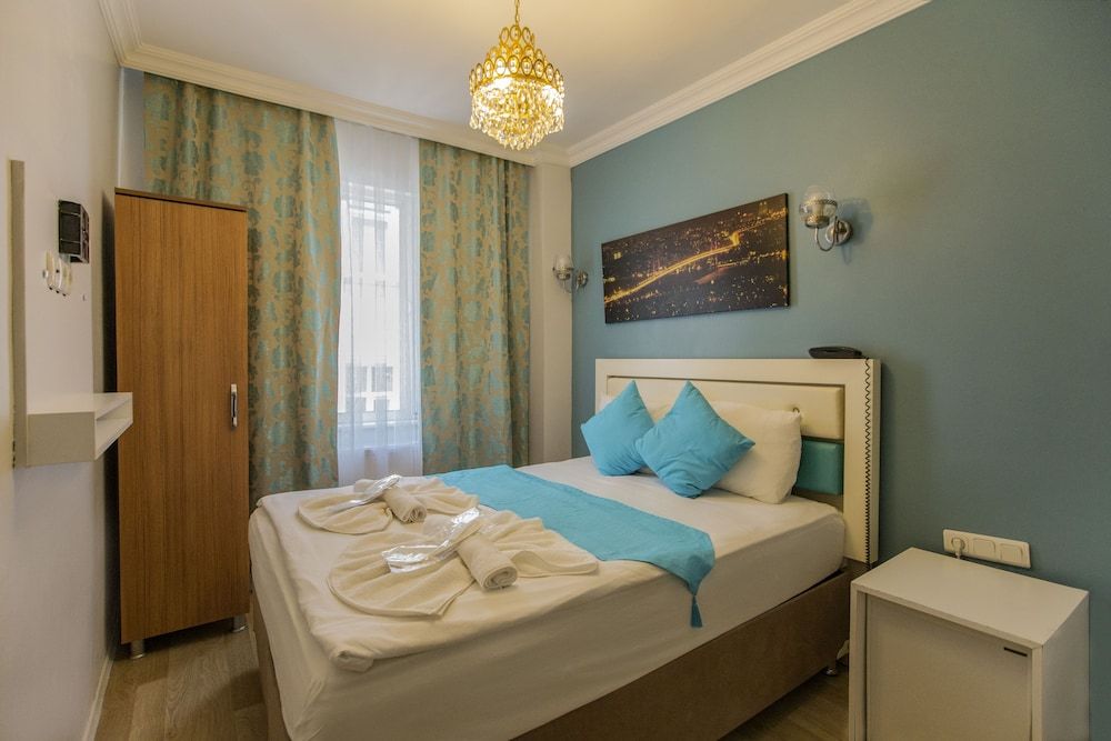 Royal Family Hotel Family Room, 2 Bedrooms 4