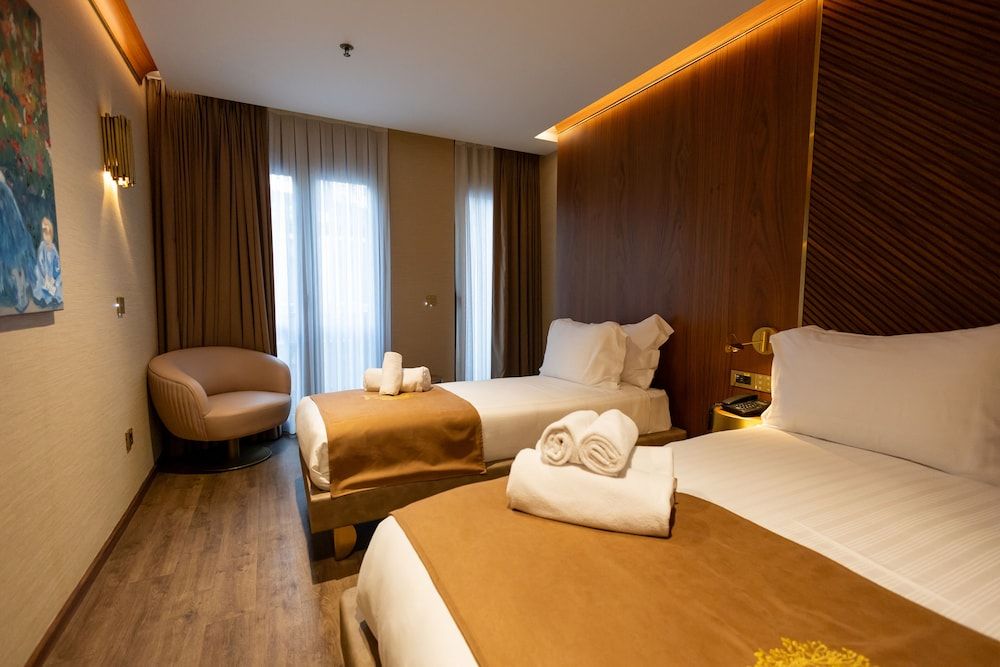 Deluxe Triple Room