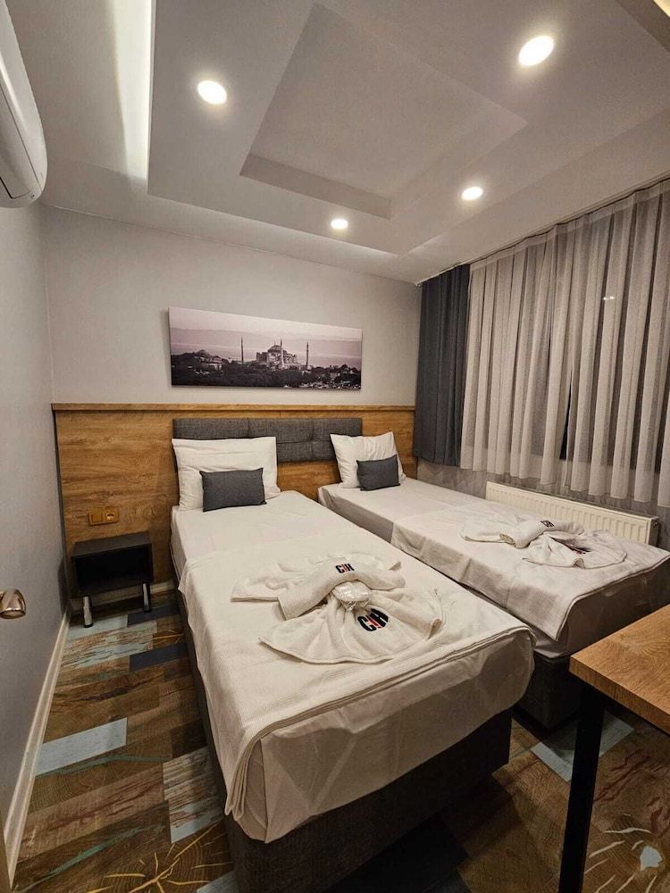 Check in Hotel Family Quadruple Room 10