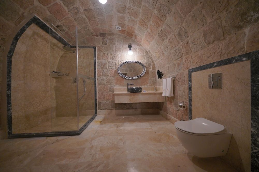 Cappadocia Secret Hill Cave Suites Deluxe Arch Room With Fireplace 6