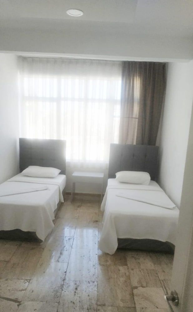 Ak Asya Pansiyon Basic Quadruple Room 3