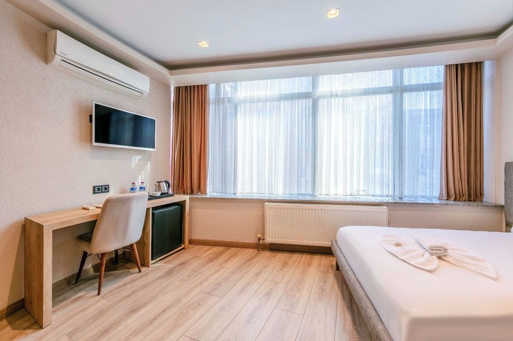 Evim Hotel Deluxe Single Room 3