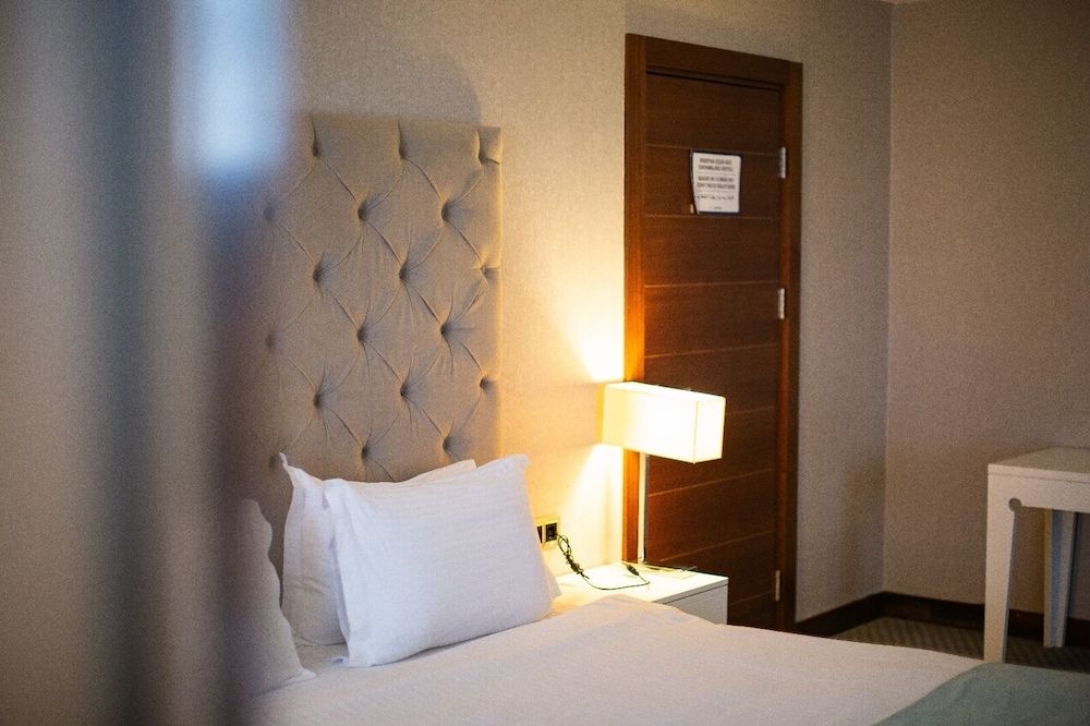 Nevali Hotel Deluxe Triple Room 2