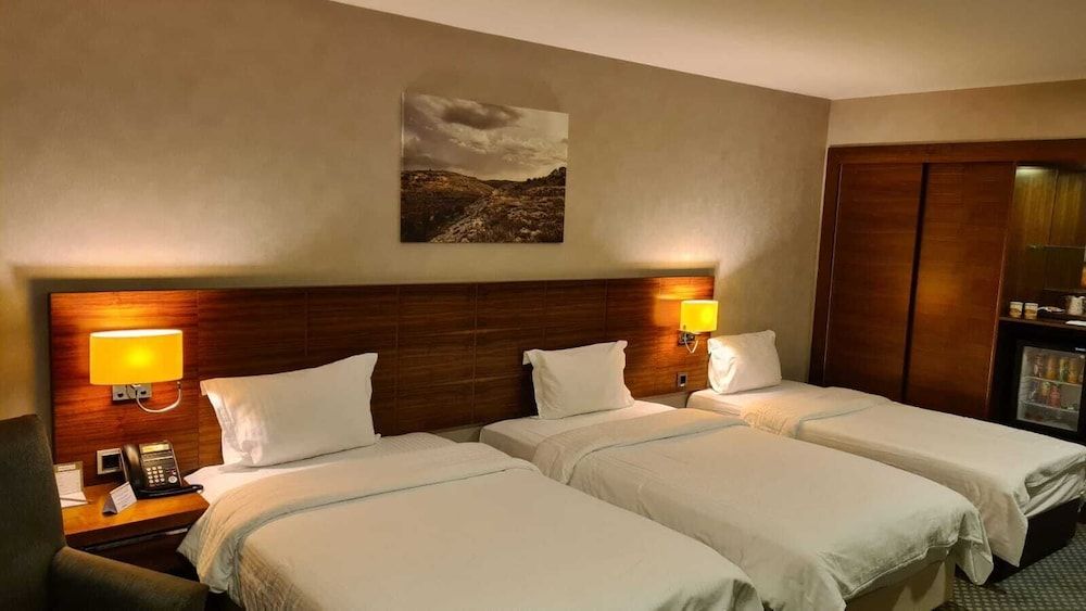 Nevali Hotel Deluxe Triple Room