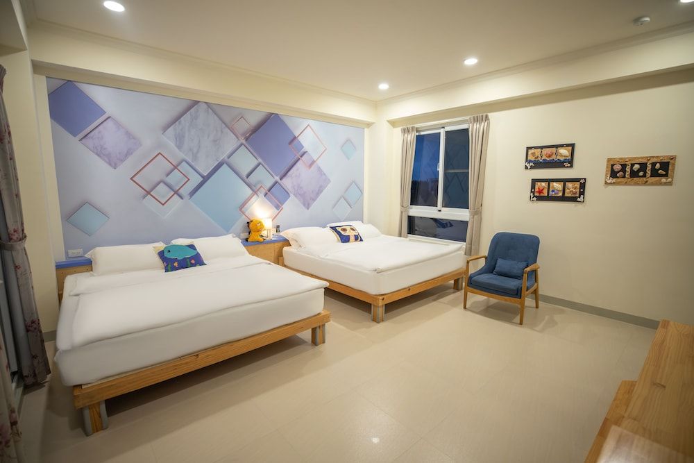 Starrysky Family Deluxe Quadruple Room, Multiple Beds, Non Smoking, Partial Ocean View 4