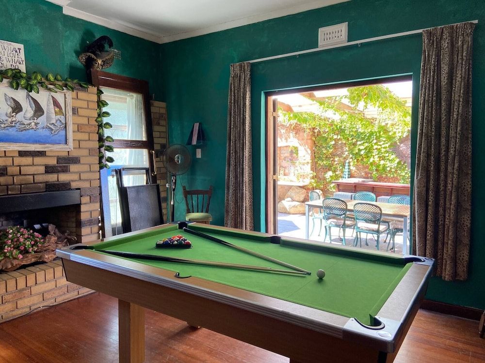 Room-living In Camps Bay Blue Room, 1 Bedroom, Balcony, Garden View 16