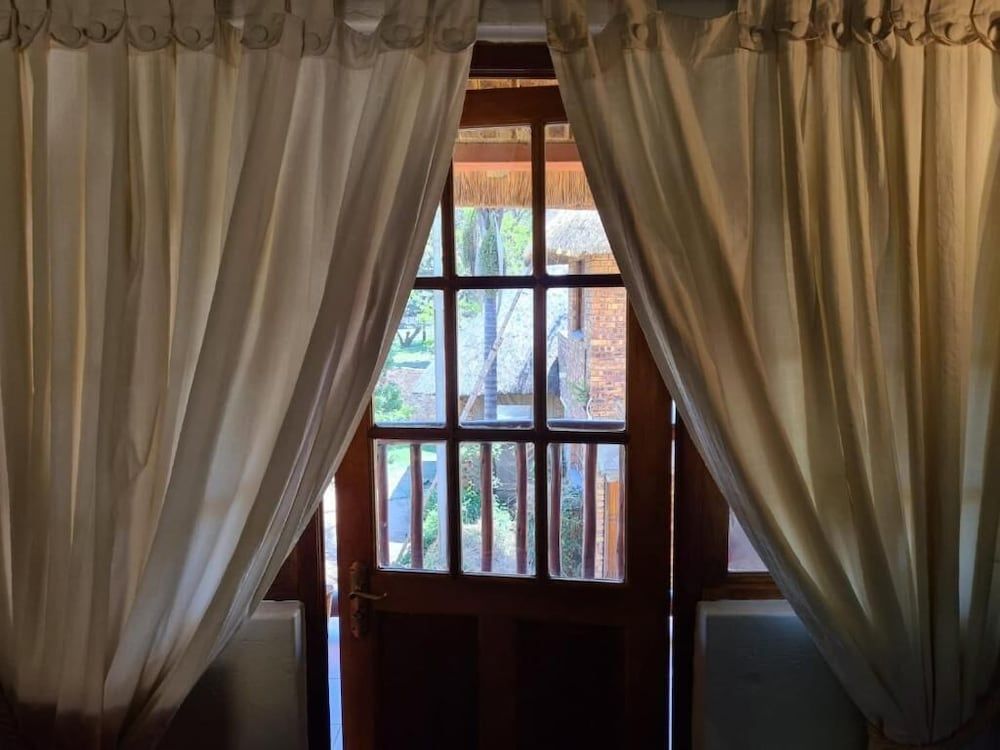 Khaya Africa Guesthouse and Spa Executive Quadruple Room, Multiple Beds, Balcony, Garden View 5