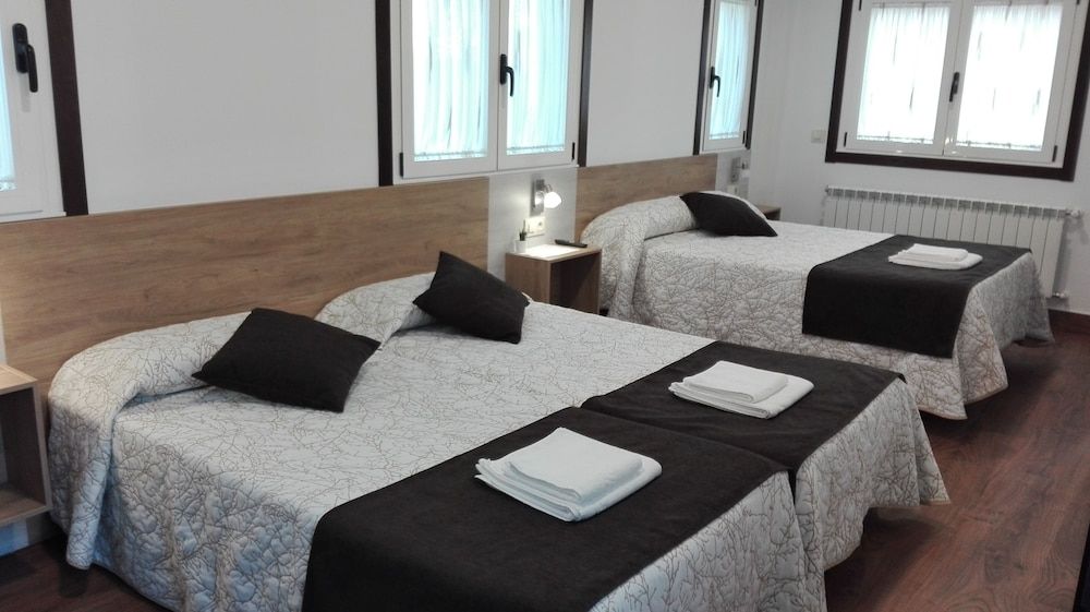 Quadruple Room (2 Twin Beds and 1 Double Bed)