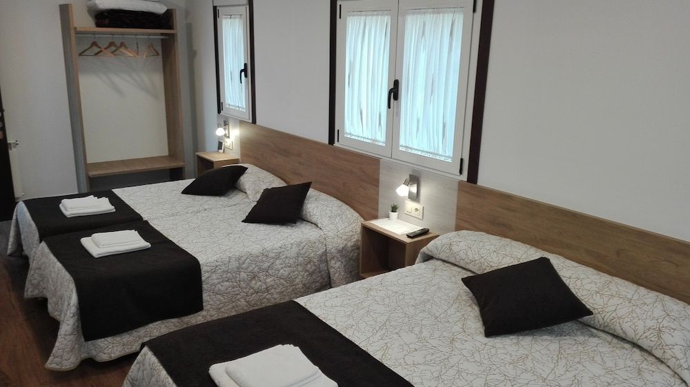Quadruple Room (2 Twin Beds and 1 Double Bed)