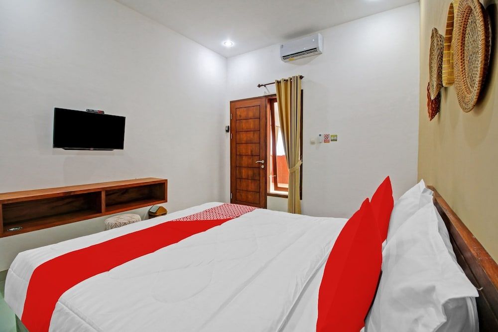 OYO 90820 Madania Guesthouse Syariah Deluxe Double Room 7