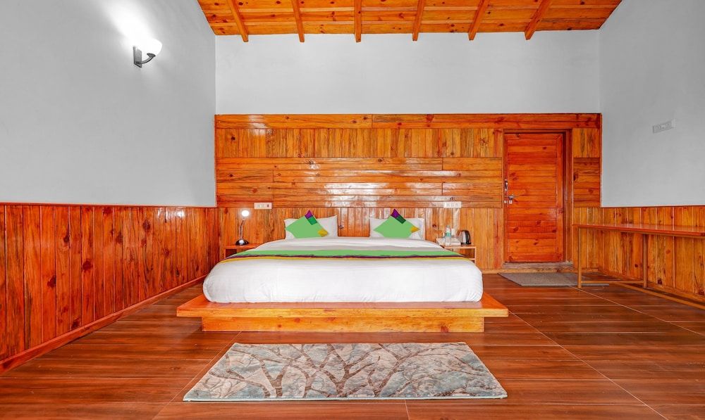 Treebo Trend Om Villa With Mountain View Premium Double Room 4