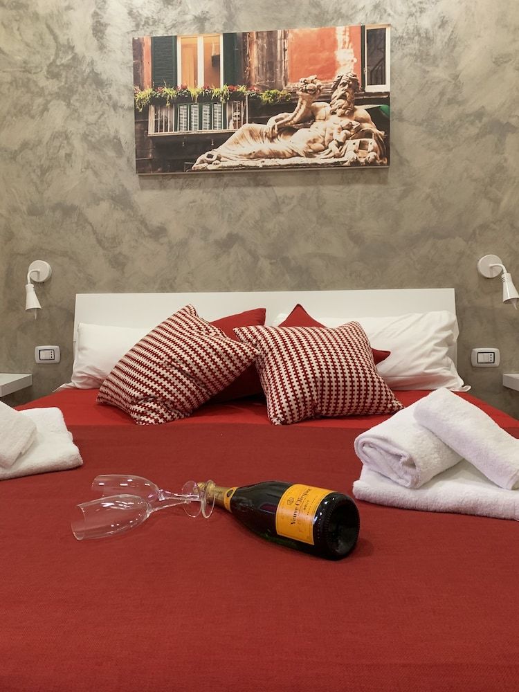 Joy Naples Deluxe Triple Room 2