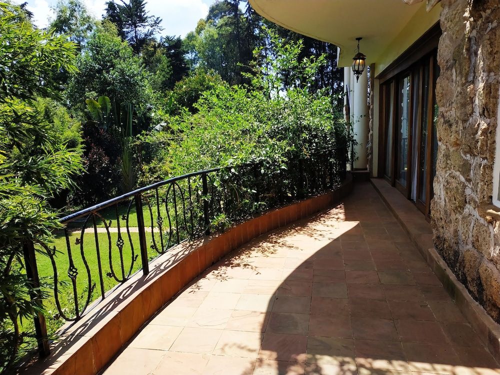 Zereniti House Junior Suite, 1 Queen Bed, Balcony, Garden View 6