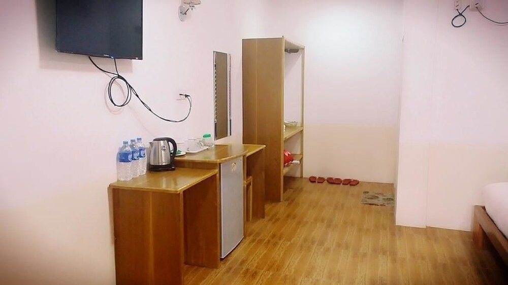 Wun Tawp Garden Hotel Deluxe Triple Room, Garden View 7