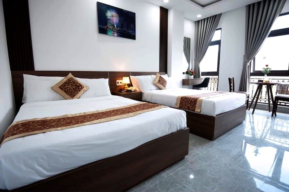 OYO 1180 Huy Ngoc Hotel Deluxe Twin Room 6