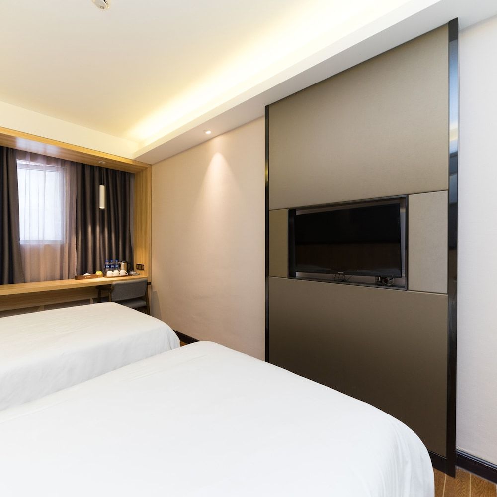 Wenxin Hotel Gangding Elite Triple Room, Non Smoking 3