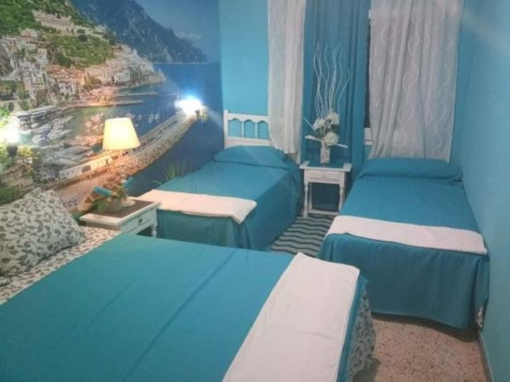 Quadruple Room, Shared Bathroom