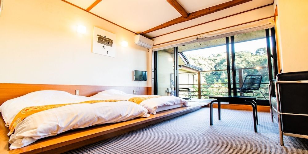 Twin Room with Low Beds - Non-Smoking, Shared Bathroom