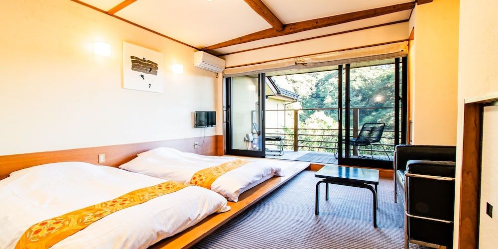 Twin Room with Low Beds - Non-Smoking, Shared Bathroom