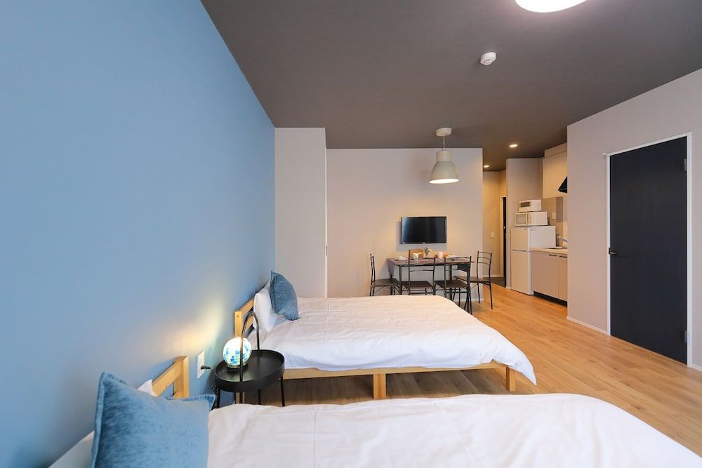 HOTALU Universal Vacation Kan Apartment Twin Room + 1 Sofa Bed 9