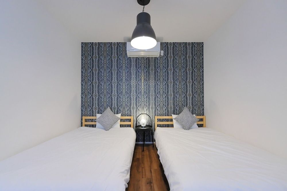 HOTALU Universal Vacation Kan Apartment Twin Room + 1 Sofa Bed 4