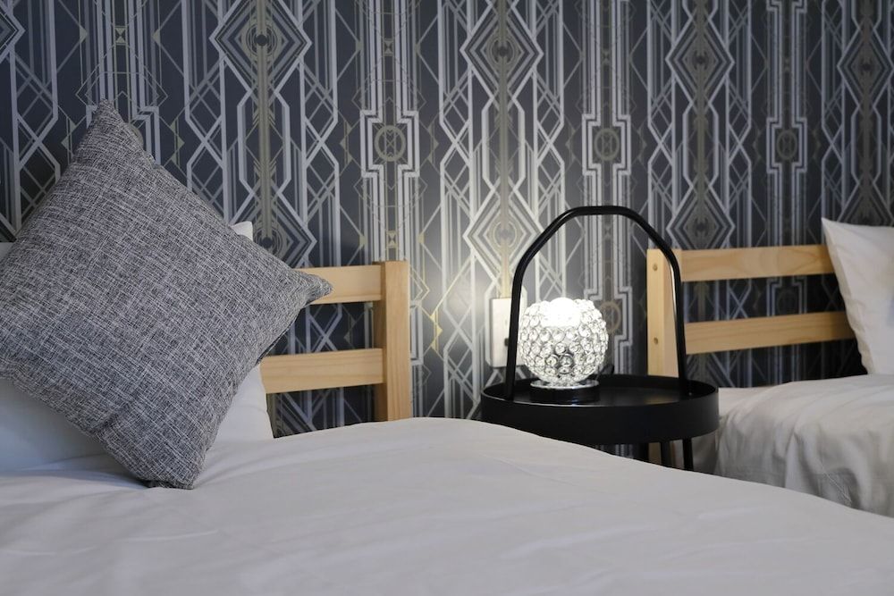 HOTALU Universal Vacation Kan Apartment Twin Room + 1 Sofa Bed