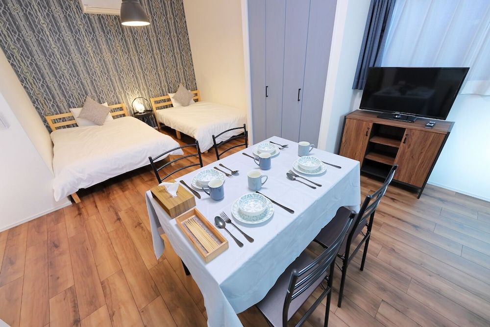 HOTALU Universal Vacation Kan Apartment Twin Room + 1 Sofa Bed 90