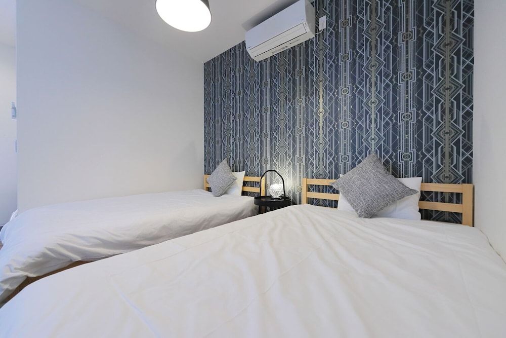 HOTALU Universal Vacation Kan Apartment Twin Room + 1 Sofa Bed 18