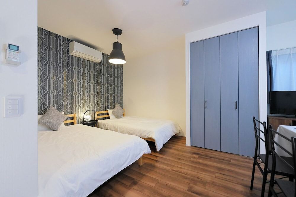 HOTALU Universal Vacation Kan Apartment Twin Room + 1 Sofa Bed 6