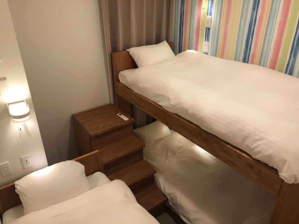 Family Room with Shared Bathroom (1 Bed)