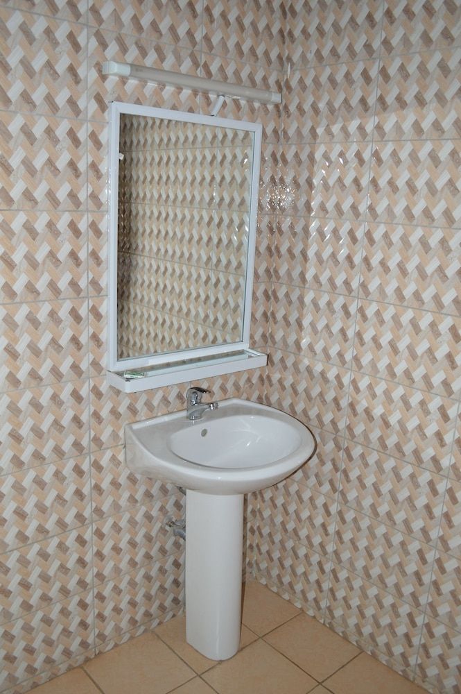 Kilimanjaro Resort Deluxe Triple Room 8