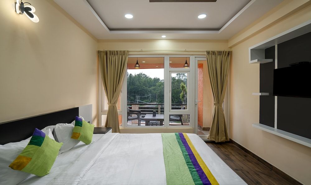 Treebo Sky Vista Suites with Hill View Standard Double Room 4