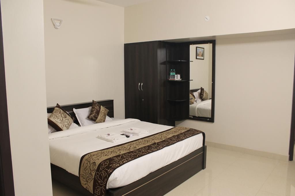 Viswa Residency by Azalea Deluxe Double Room 2