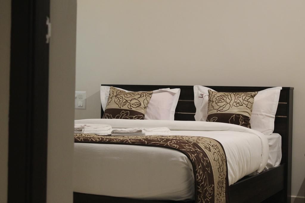 Viswa Residency by Azalea Deluxe Double Room