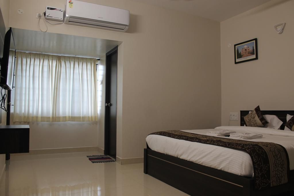 Viswa Residency by Azalea Deluxe Double Room 5
