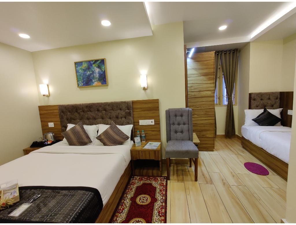 Queen Triple Bed Suite Room